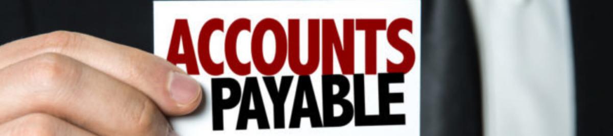 accounts payable typed on paper