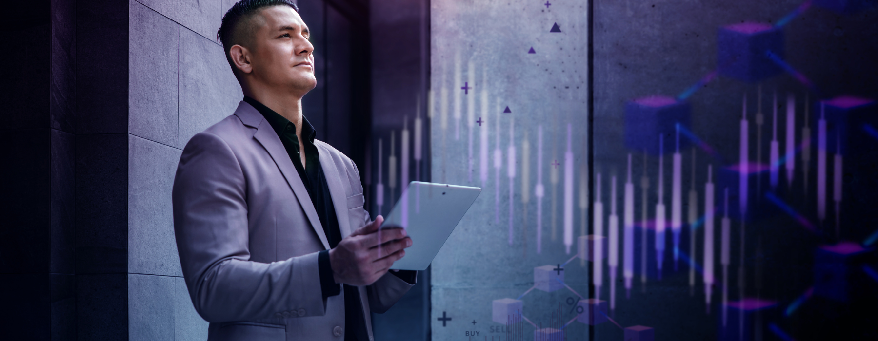 businessman in suit holding tablet showing the mobile capability of working from anywhere