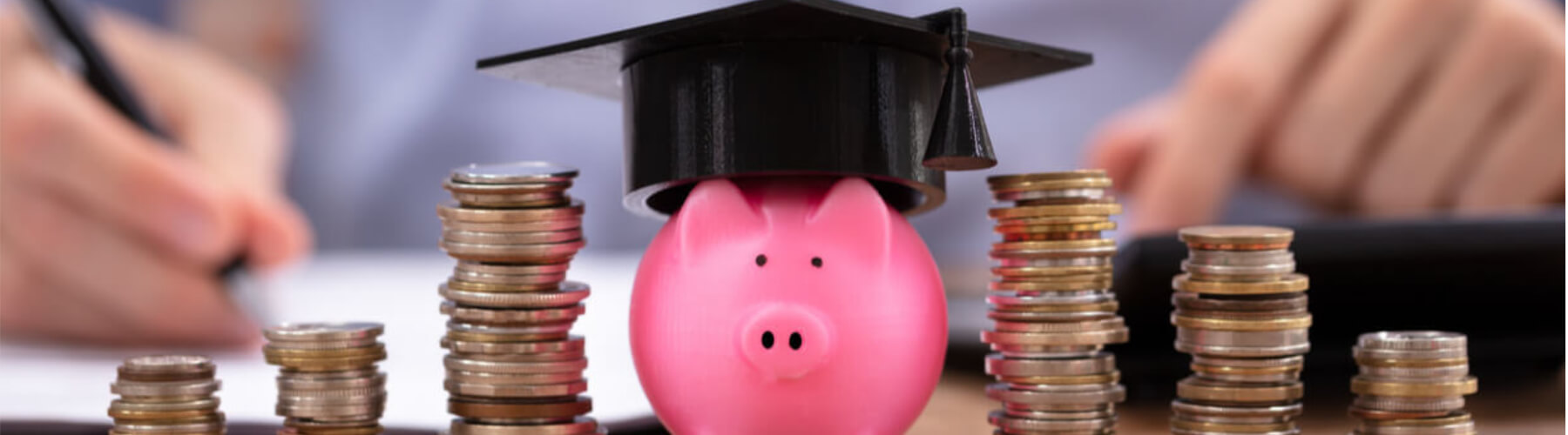 education budget concept, piggy bank, graduation cap