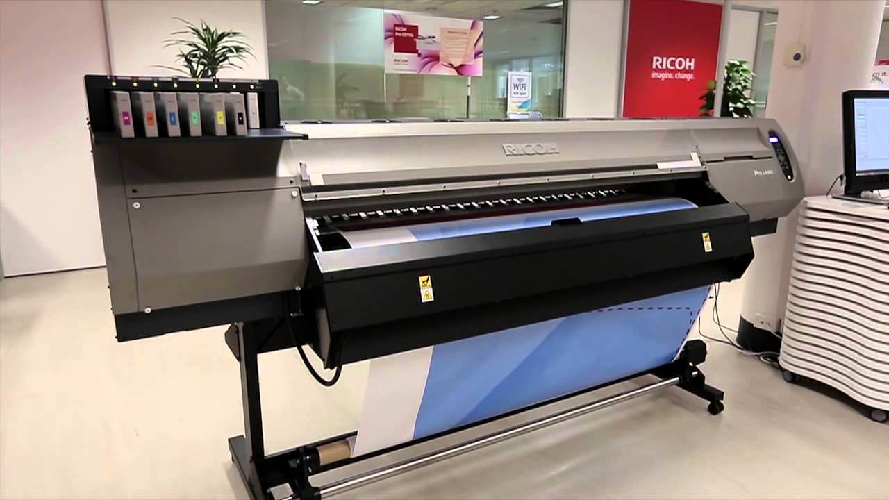 wide format printer in the middle of an office