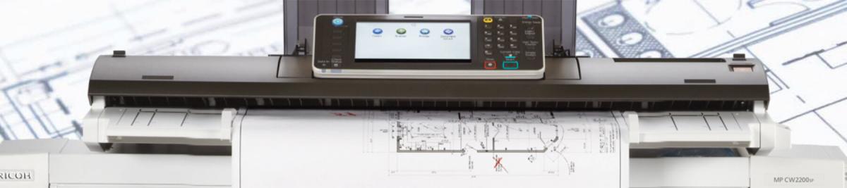close-up of a large format printer, printing blueprints