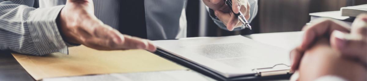 lawyer reviewing physical documents