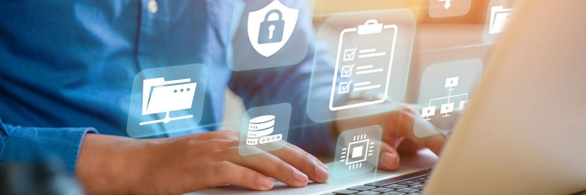 using laptop for work, security and cloud concept